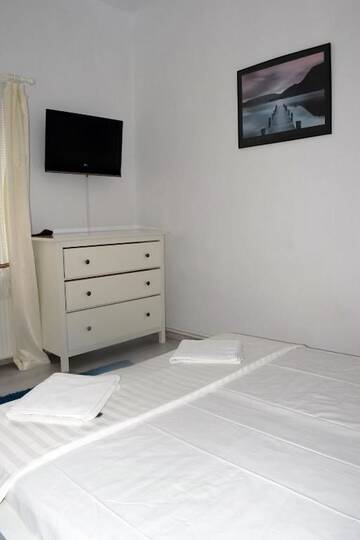 Фото номера Апартаменты с 3 спальнями Гостевой дом Casa Aurora г. Кэлимэнешти 35