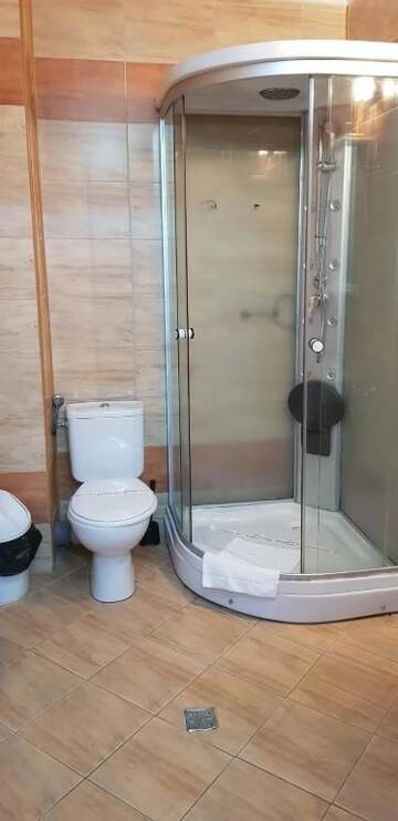 Фото номера Двухместный номер с 2 отдельными кроватями Отель Complex Turistic Casa Romaneasca г. Кэлимэнешти 7