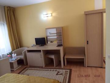 Фото номера Двухместный номер с 2 отдельными кроватями Отель Complex Turistic Casa Romaneasca г. Кэлимэнешти 10